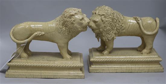 A pair of stoneware lions